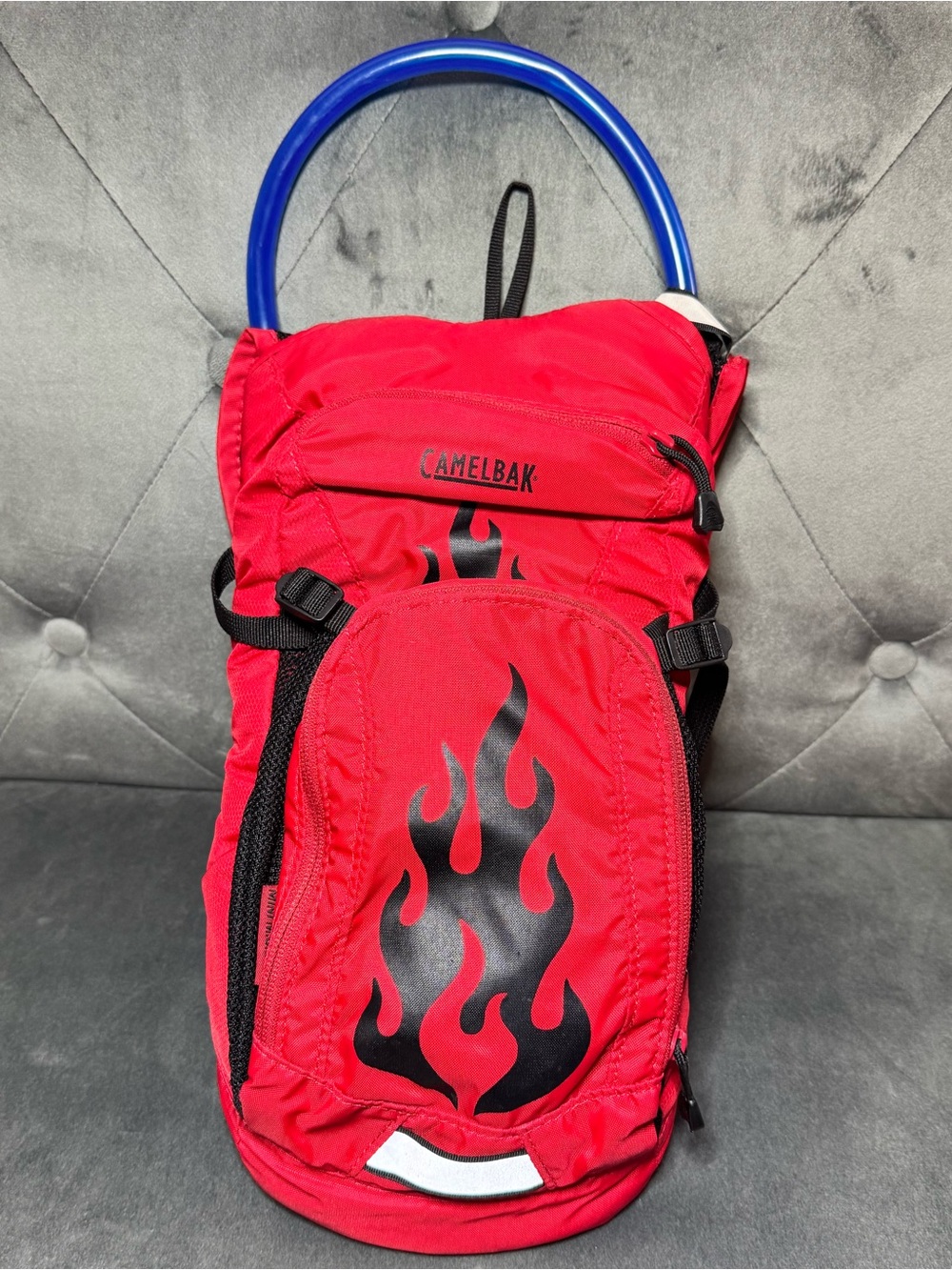 CamelBak Mini M.U.L.E. Kids’ Hydration Red Backpack with Black Flame Graphic